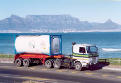A tank container on a truck in Cape Town, Table Mountain behind